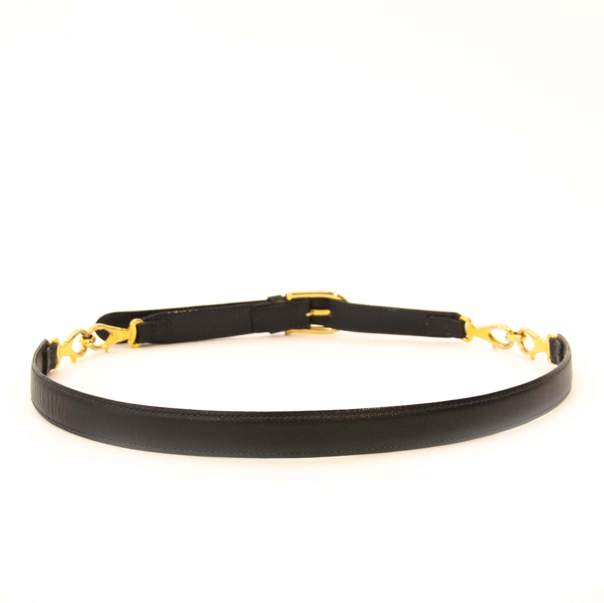 Buy this authentic second hand vintage Céline Black Belt Golden Details at online webshop LabelLOV. Safe and secure shopping. Koop deze authentieke Céline Black Belt Golden Details bij online webshop LabelLOV.