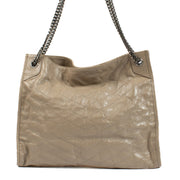 Authentic pre-loved Saint Laurent Beige Niki Medium Shopping Bag on Labellov.com