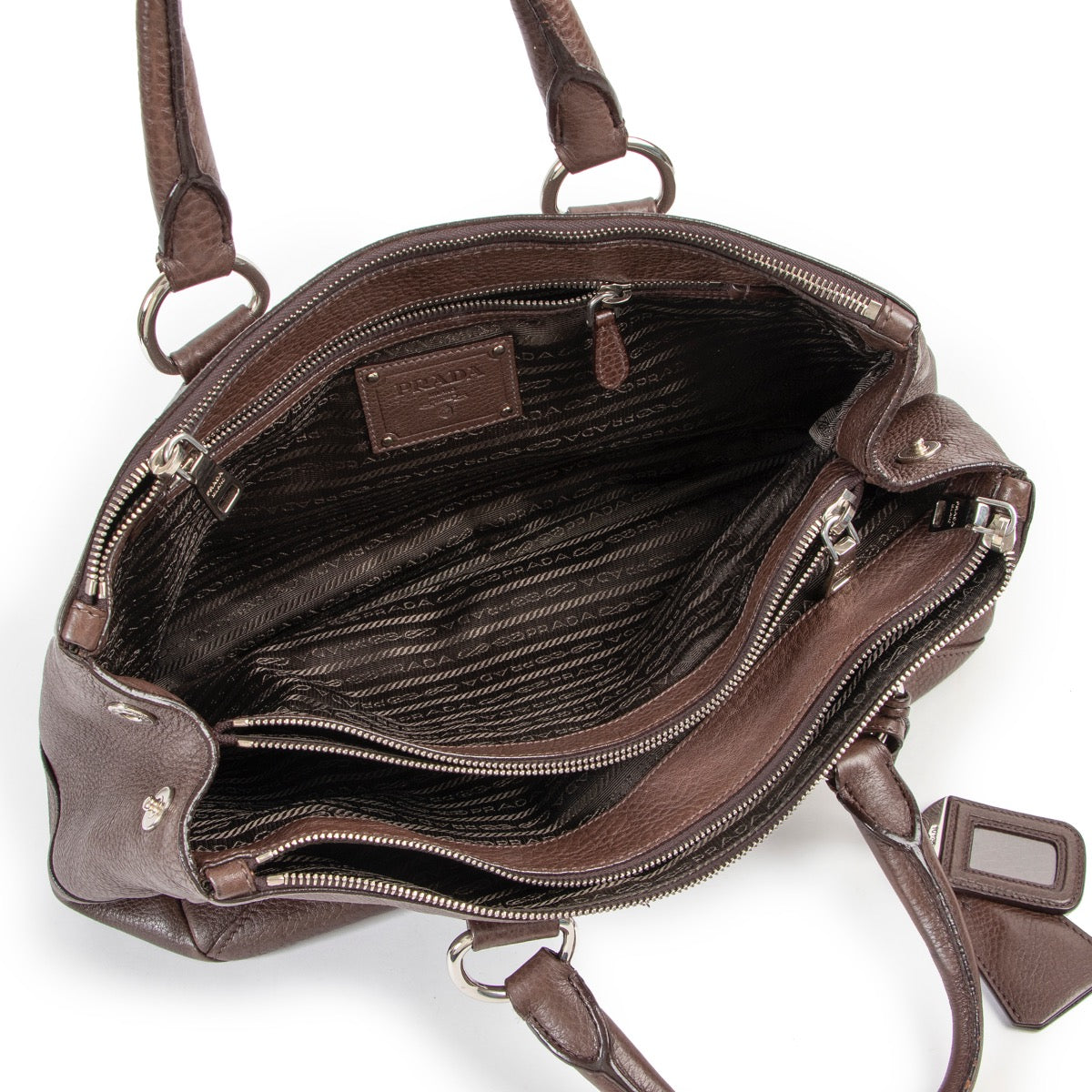 Shop safe online at Labellov in Antwerp this 100% authentic second hand Prada Brown Leather Top Handle