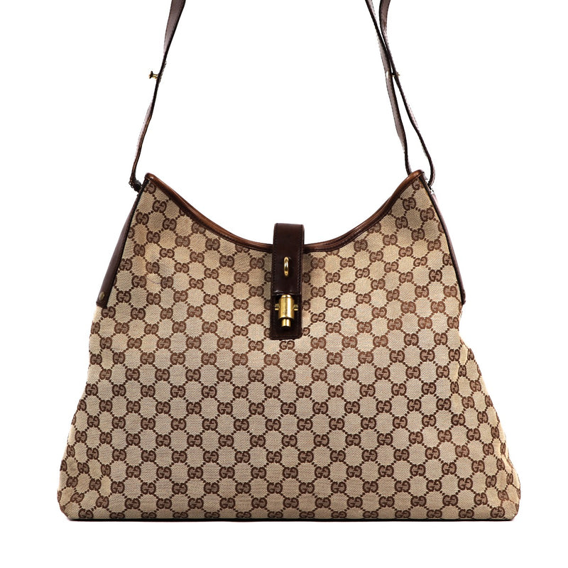 Buy an authentic second-hand Gucci Monogram Canvas Hobo Bag in good condition at Labellov in Antwerp.