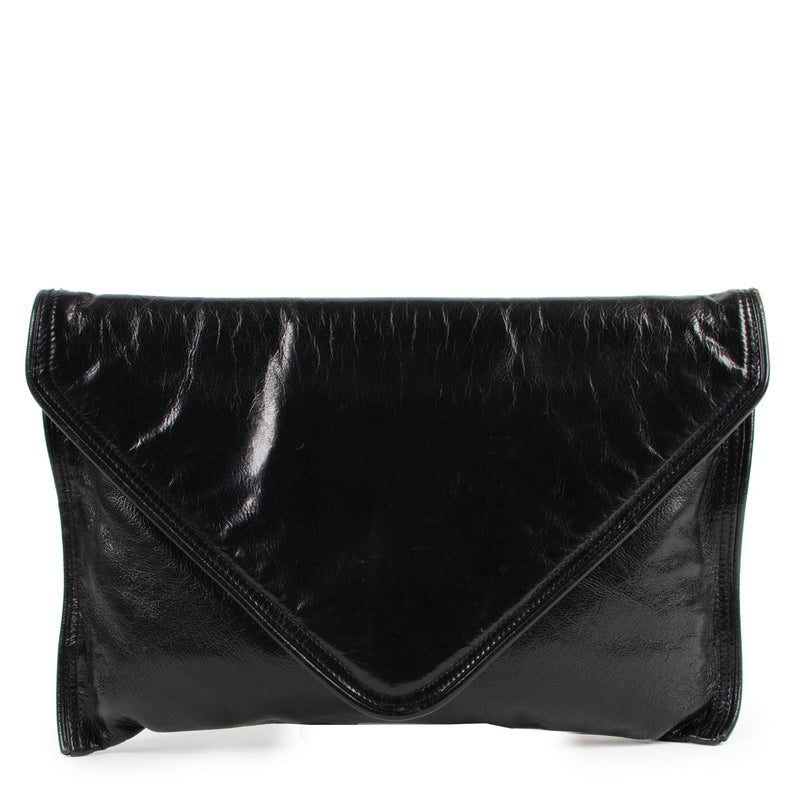 Buy online an authenic second hand Bottega Veneta Vintage Black Glossy Leather Clutch in very good at Labellov in Antwerp.