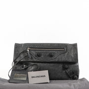 Buy an authentic Balenciaga Grey Leather Clutch in good condition at Labellov in Antwerp.