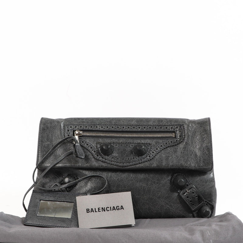 Buy an authentic Balenciaga Grey Leather Clutch in good condition at Labellov in Antwerp.