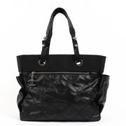 Shop safe online at Labellov in Antwerp, Brussels and Knokke this 100% authentic second hand Chanel Black Coated Canvas Paris-Biarritz Tote Bag