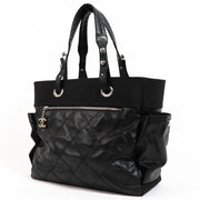Shop safe online at Labellov in Antwerp, Brussels and Knokke this 100% authentic second hand Chanel Black Coated Canvas Paris-Biarritz Tote Bag