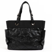 Shop safe online at Labellov in Antwerp, Brussels and Knokke this 100% authentic second hand Chanel Black Coated Canvas Paris-Biarritz Tote Bag