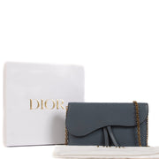 Shop safe online at Labellov in Antwerp, Brussels and Knokke this 100% authentic second hand Christian Dior Blue Leather Long Saddle Wallet Clutch