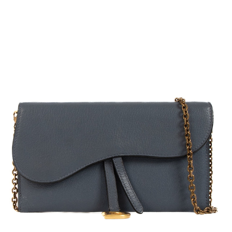 Shop safe online at Labellov in Antwerp, Brussels and Knokke this 100% authentic second hand Christian Dior Blue Leather Long Saddle Wallet Clutch