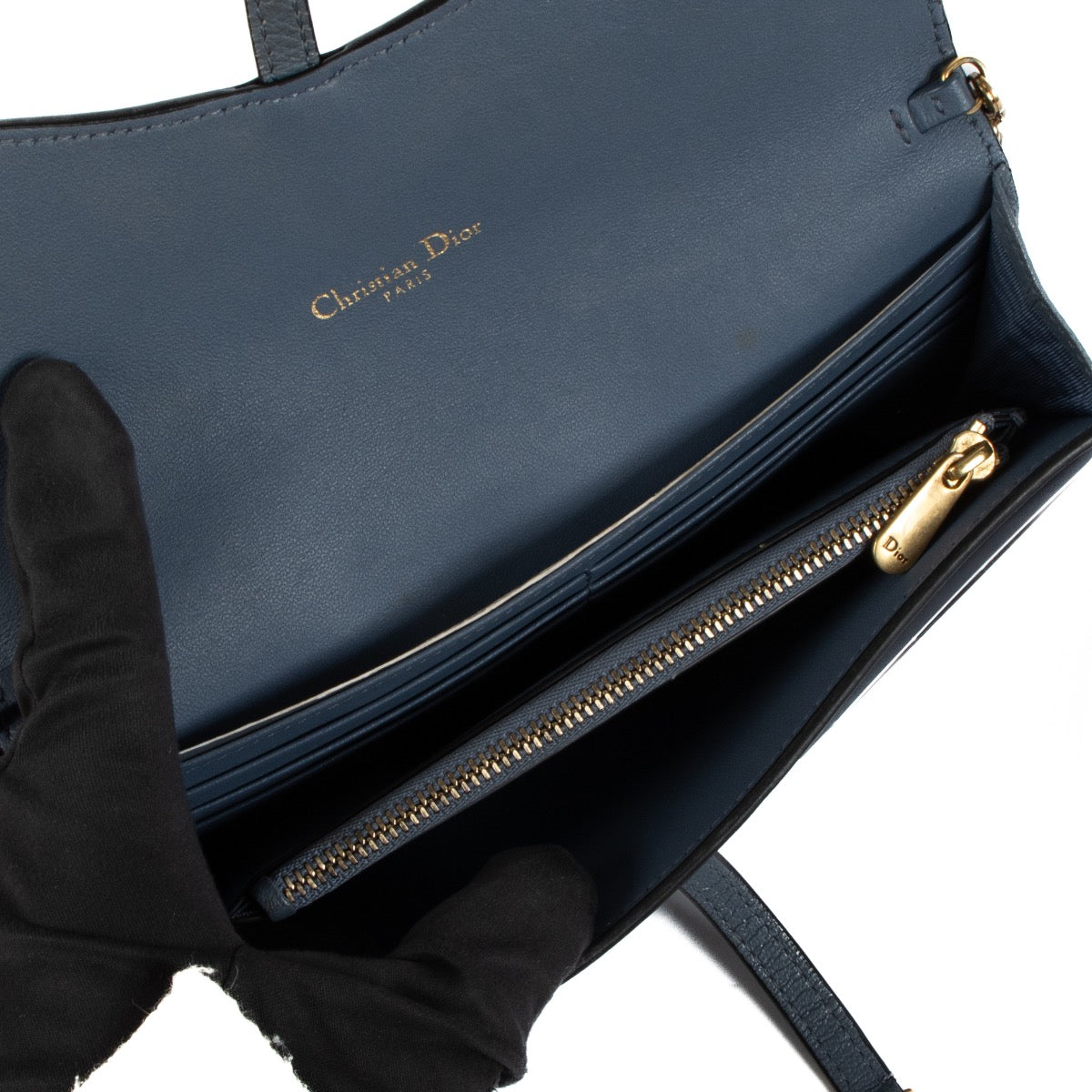 Shop safe online at Labellov in Antwerp, Brussels and Knokke this 100% authentic second hand Christian Dior Blue Leather Long Saddle Wallet Clutch
