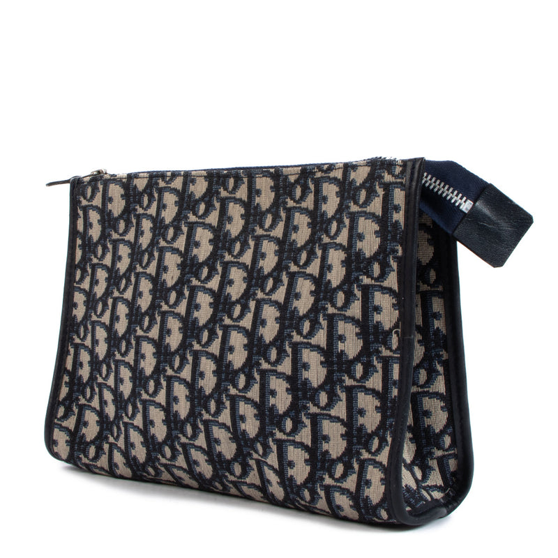 Buy and sell your authentic designer Christian Dior Oblique Vintage Clutch for the best price at Labellov