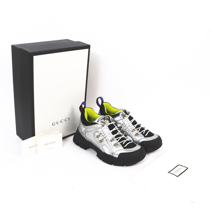 Buy an authentic second hand Gucci Silver Liquid Silk Calf Docro Sneakers - Size 41 in very good condition at Labellov Antwerp.