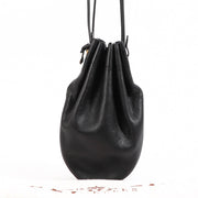 Buy an authentic Delvaux Black Leather Bucket Bag in very good condition at Labellov in Antwerp.