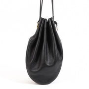 Buy an authentic Delvaux Black Leather Bucket Bag in very good condition at Labellov in Antwerp.