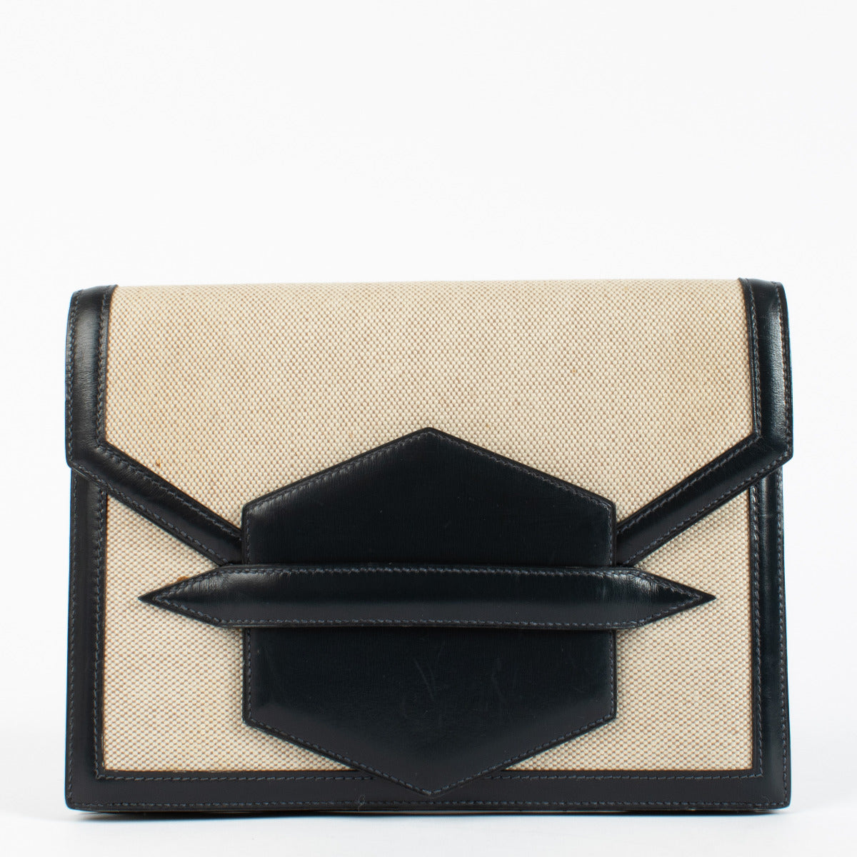 Hermès Faco Clutch embodies the brand's heritage of discreet luxury.