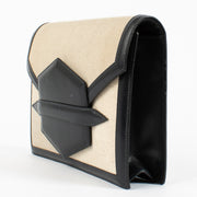 Hermès Faco Clutch embodies the brand's heritage of discreet luxury.