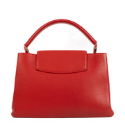 Shop safe online at Labellov in Antwerp, Brussels and Knokke this 100% authentic second hand Louis Vuitton Rubis Taurillon Leather Capucines MM Top Handle