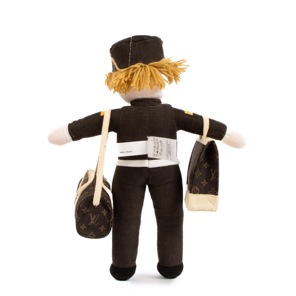 Shop safe online at Labellov in Antwerp, Brussels and Knokke this 100% authentic second hand Louis Vuitton Groom Bell Boy Doll