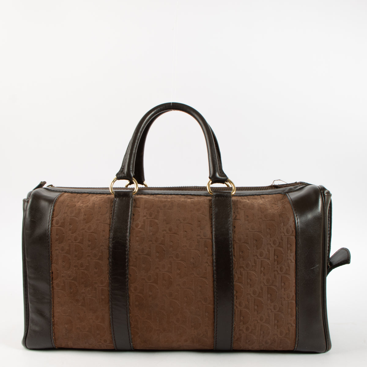 Shop the authentic Christian Dior Vintage Brown Oblique Empreinte Duffle Bag on Labellov.com.