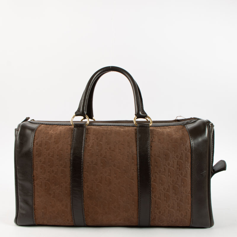 Shop the authentic Christian Dior Vintage Brown Oblique Empreinte Duffle Bag on Labellov.com.