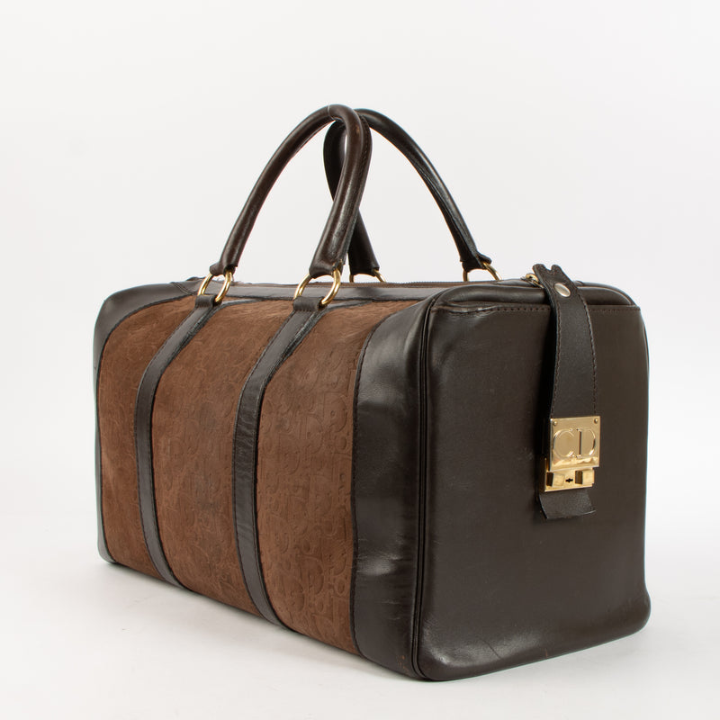 Shop the authentic Christian Dior Vintage Brown Oblique Empreinte Duffle Bag on Labellov.com.