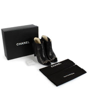 shop 100% authentic second hand Chanel Black Chain Peep Toe Leather Boots - Size 41 1/2 on Labellov.com