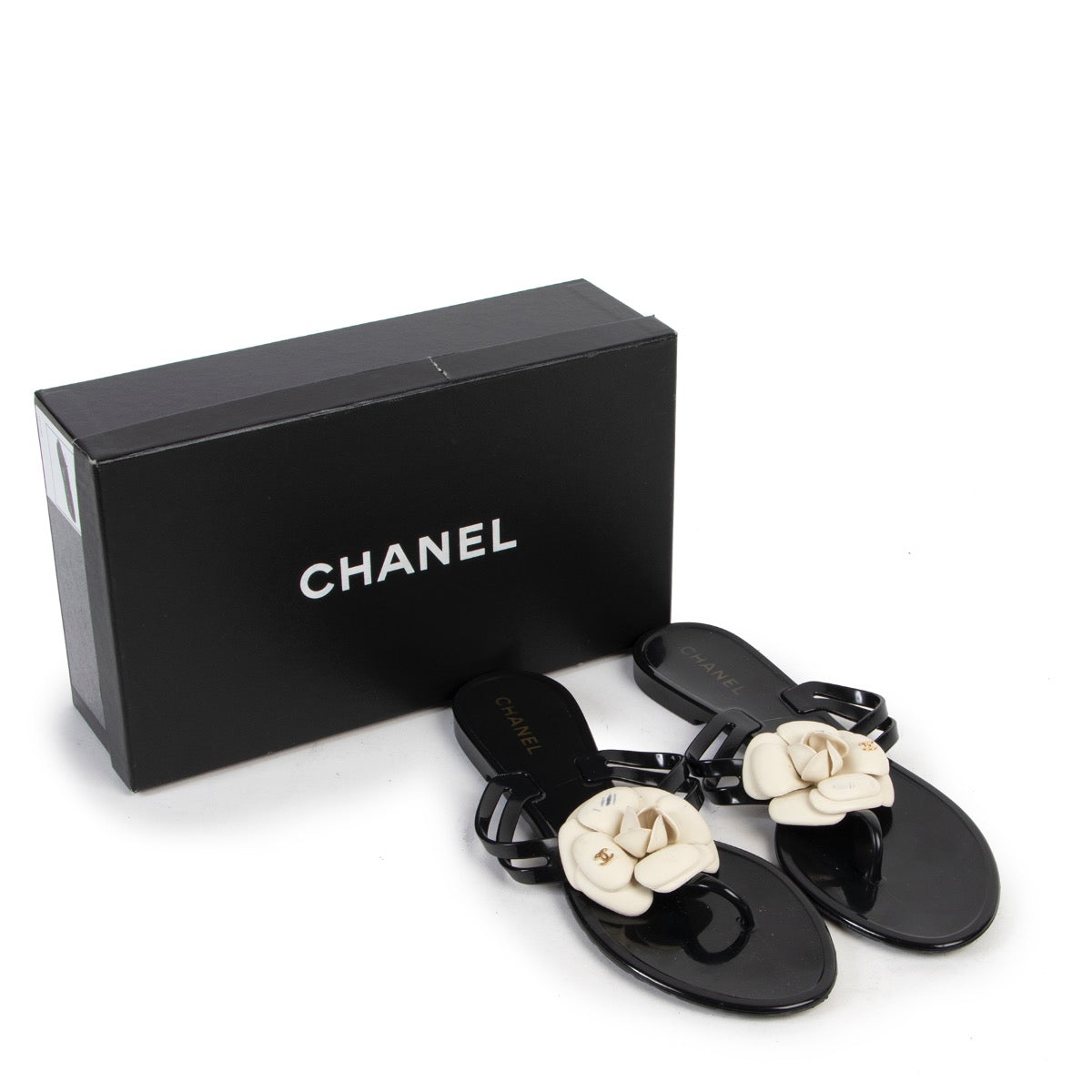 Shop safe online at Labellov in Antwerp these 100% authentic second hand Chanel Black Flower Sandals - Size 41