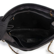 Now availabel to be bought at Labellov Luxury. buy and sell your designer items at Labellov for a reasonable price and with great service. Get this Chanel Vintage Black Quilted Shopper now online or in store