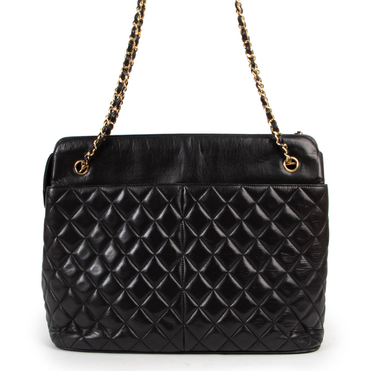 Now availabel to be bought at Labellov Luxury. buy and sell your designer items at Labellov for a reasonable price and with great service. Get this Chanel Vintage Black Quilted Shopper now online or in store
