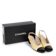 Shop safe online at Labellov in Antwerp this 100% authentic second hand Chanel Yellow and Black Patent Leather Pumps - Size 40