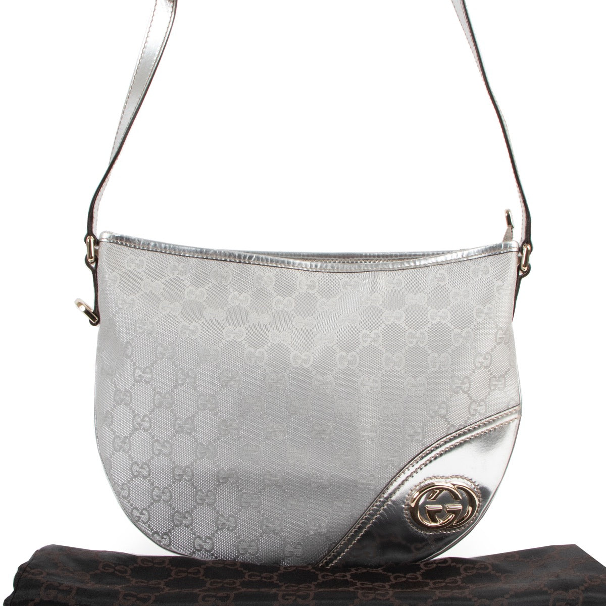 Buy online authentic second hand Gucci Silver GG Canvas Britt Messenger Crossbody Bag in very good condition at Labellov in Antwerp