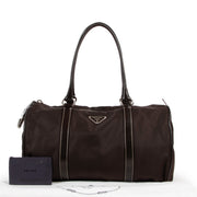 Buy and sell designer items at Labellov Luxury. Get this Prada Brown Nylon Duffle Bag online or in the showroom in Antwerp.