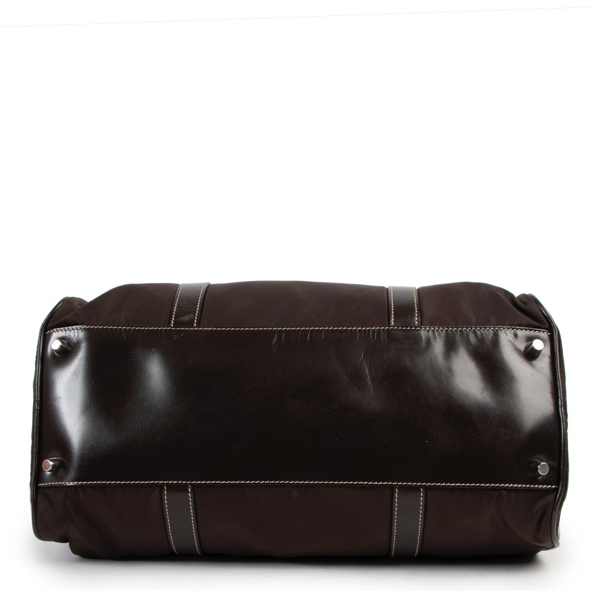 Buy and sell designer items at Labellov Luxury. Get this Prada Brown Nylon Duffle Bag online or in the showroom in Antwerp.