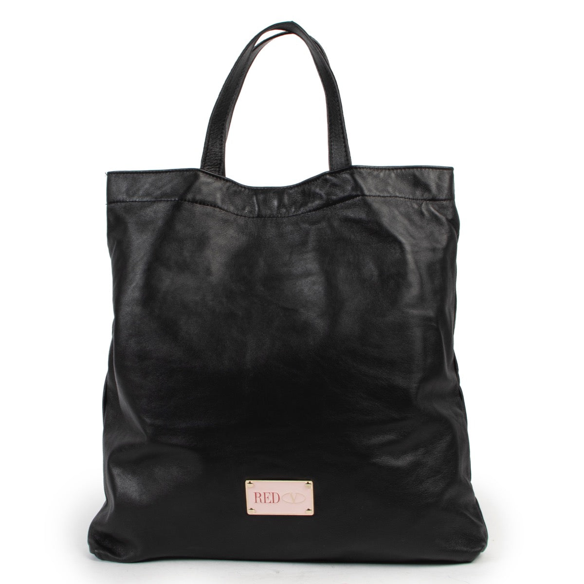 Red Valentino Black Leather Tote Bag now available at Labellov for a reasonable price and in very good condition. Shop 24/7 online or come by in our showroom in Antwerp
