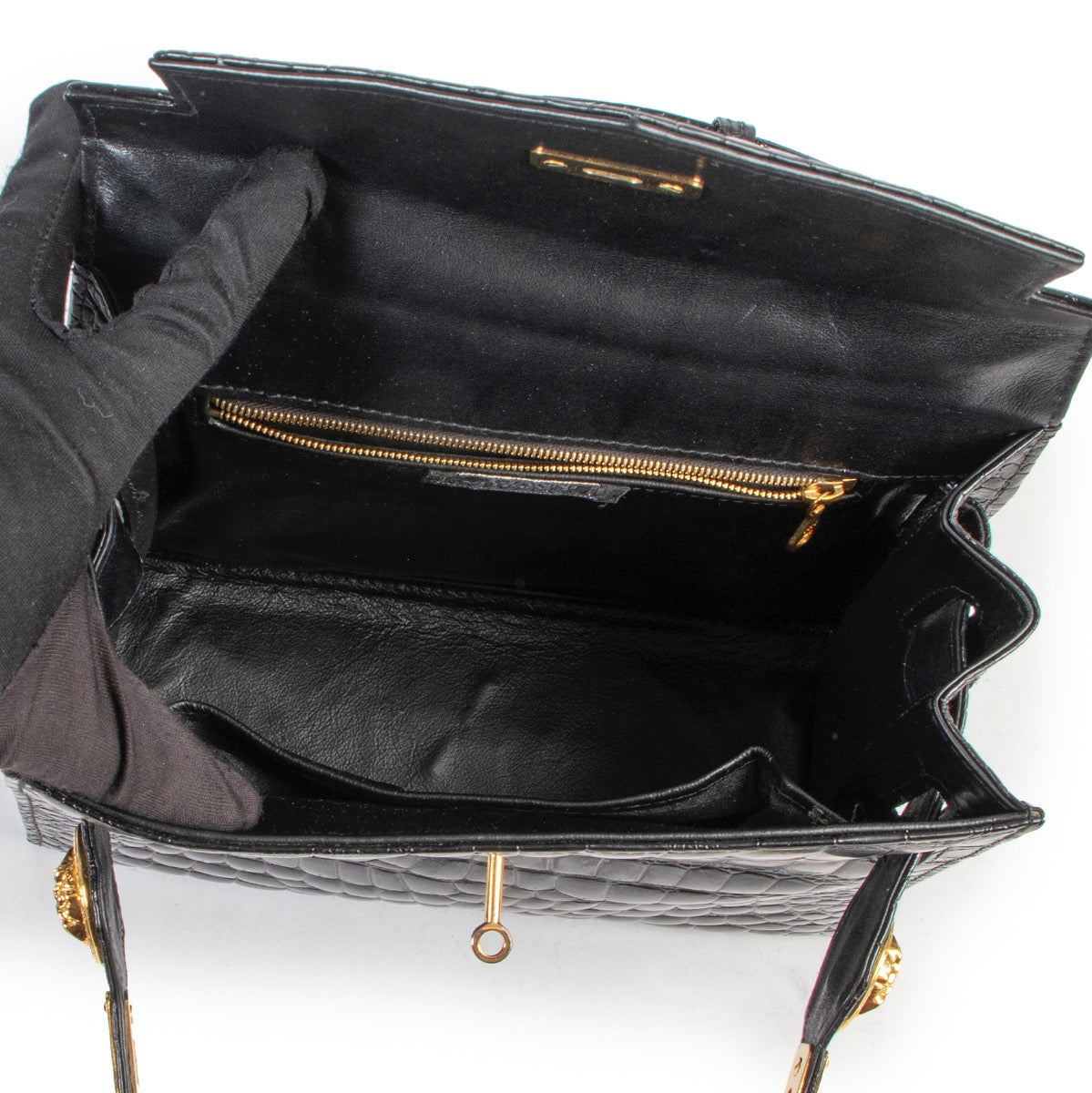 Get this Versace Medusa Crocodile Embossed Black Satchel Top Handle at Labellov Luxury in good condition. Buy and sell your designer items for a reasonable price.