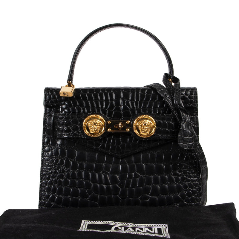 Get this Versace Medusa Crocodile Embossed Black Satchel Top Handle at Labellov Luxury in good condition. Buy and sell your designer items for a reasonable price.