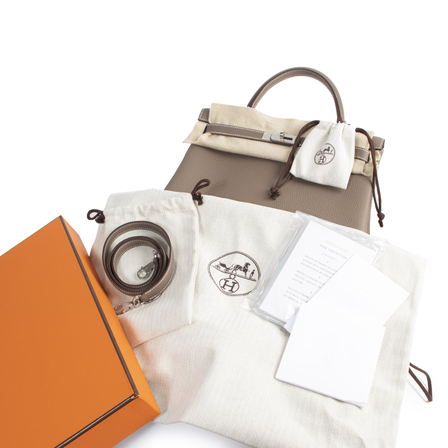 BNIB Hermès Kelly 32 Retourne Veau Etoupe PHW with worldwide shipping available online at Labellov secondhand luxury