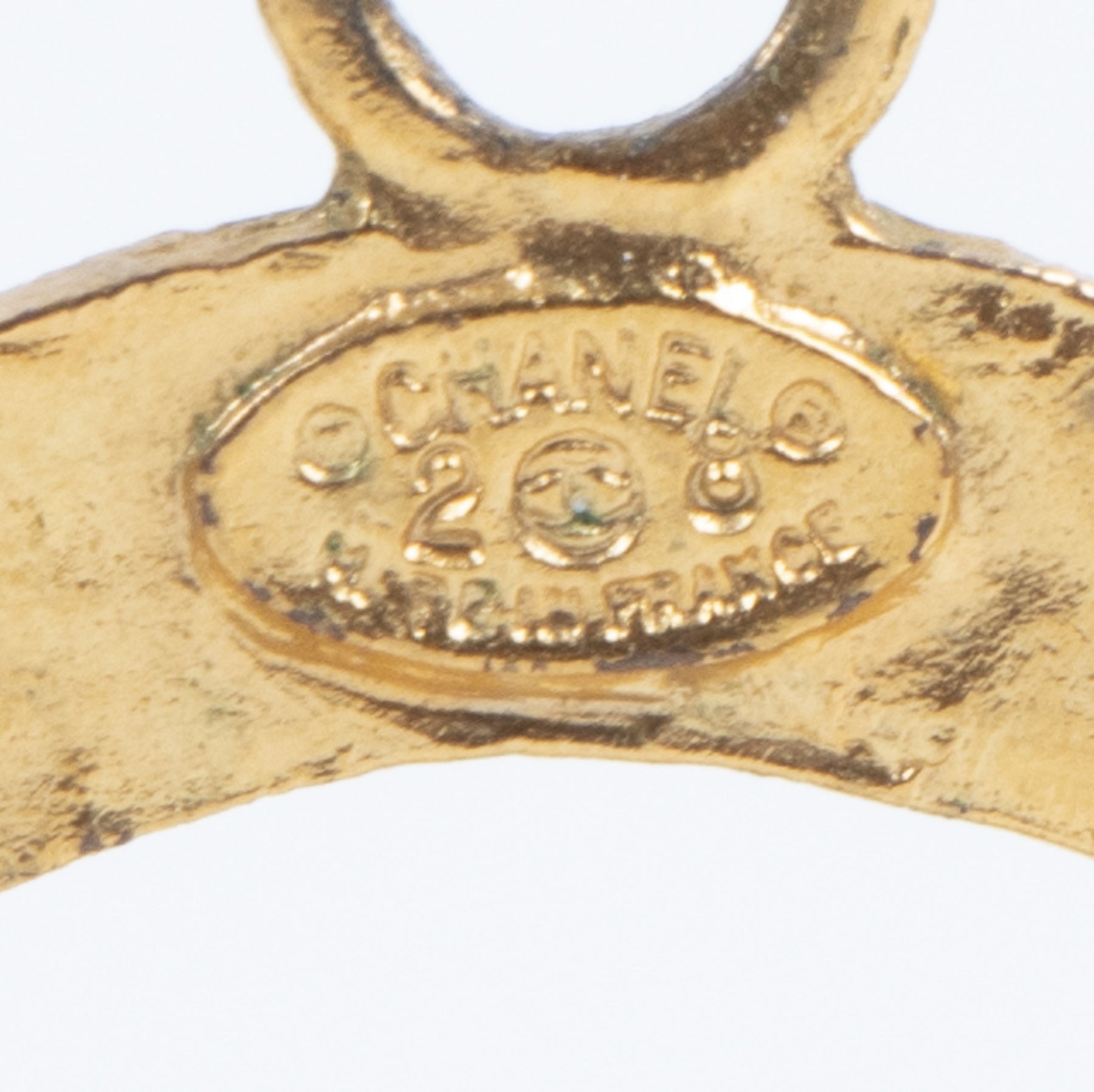 Chanel Vintage Gold Metal Clip-On Earrings for the best price at Labellov secondhand luxury in Antwerp Belgium