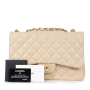 Buy authentic secondhand Chanel Beige Lambskin Classic Single Flap Jumbos at the right price at LabelLOV vintage webshop. Safe and secure online shopping. Koop authentieke tweedehands Chanel Beige Lambskin Classic Single Flap Jumbo met de juiste prijs bij