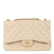 Buy authentic secondhand Chanel Beige Lambskin Classic Single Flap Jumbos at the right price at LabelLOV vintage webshop. Safe and secure online shopping. Koop authentieke tweedehands Chanel Beige Lambskin Classic Single Flap Jumbo met de juiste prijs bij