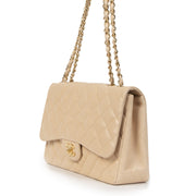Buy authentic secondhand Chanel Beige Lambskin Classic Single Flap Jumbos at the right price at LabelLOV vintage webshop. Safe and secure online shopping. Koop authentieke tweedehands Chanel Beige Lambskin Classic Single Flap Jumbo met de juiste prijs bij