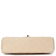 Buy authentic secondhand Chanel Beige Lambskin Classic Single Flap Jumbos at the right price at LabelLOV vintage webshop. Safe and secure online shopping. Koop authentieke tweedehands Chanel Beige Lambskin Classic Single Flap Jumbo met de juiste prijs bij