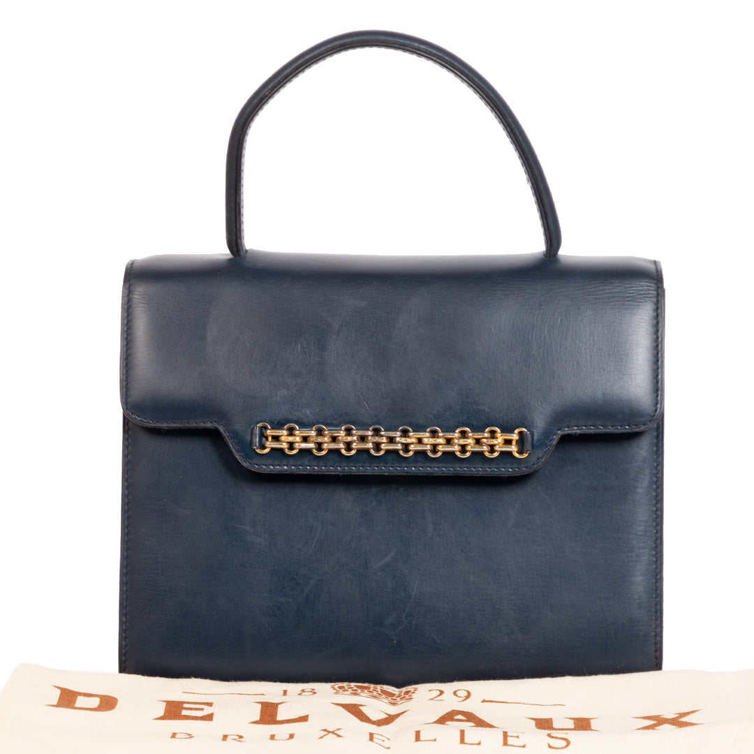Are you looking for an authentic Delvaux Vintage Blue Top Handle Bag?