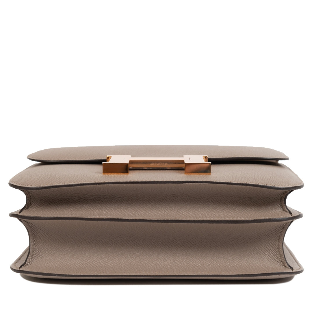 We buy and sell your 100% authentic Hermes Constance 24cm gris asphalt epsom rose gold hardware for the best price online