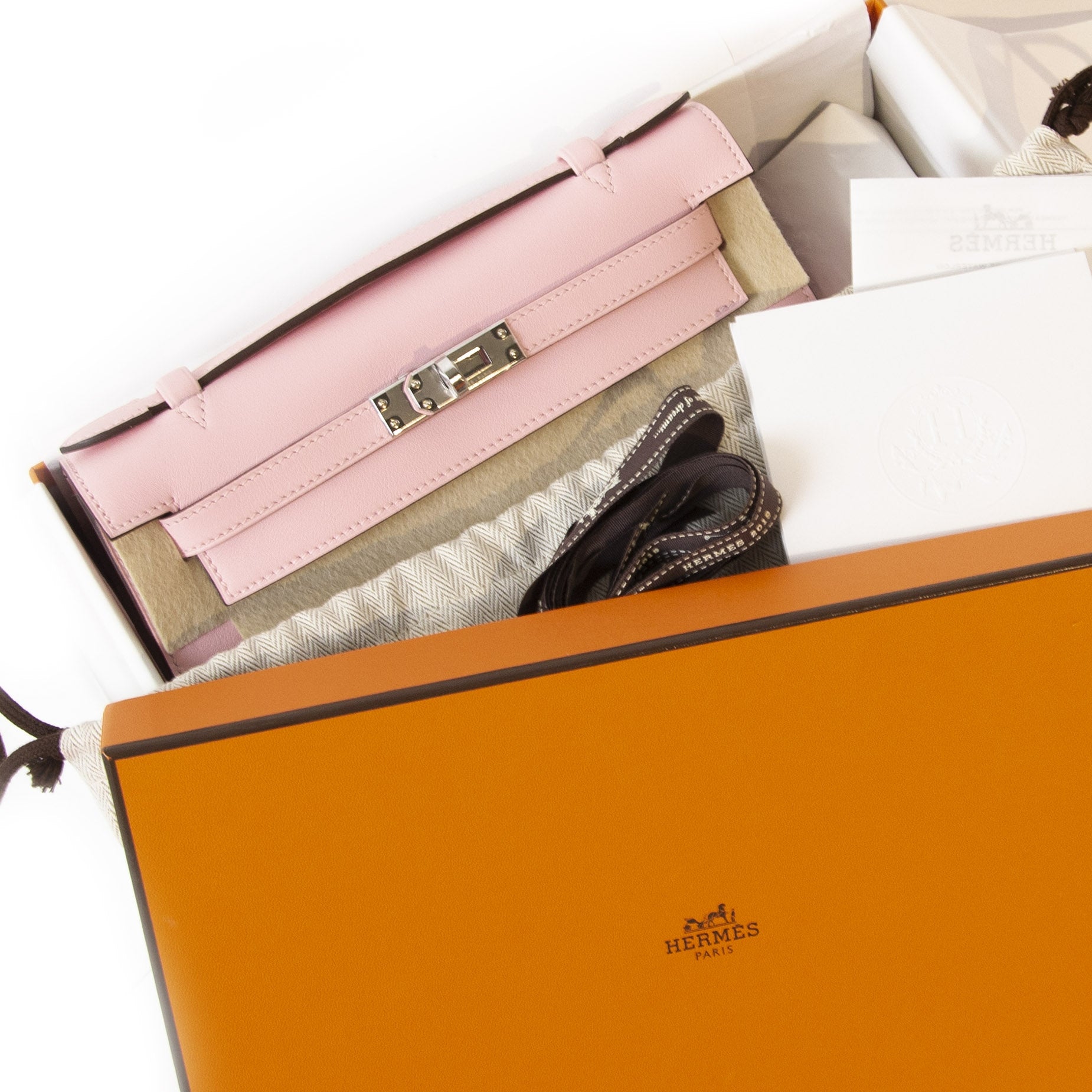 pour le meilleur prix Hermes Kelly Mini Pochette Swift Rose Sakura PHW brand new never used