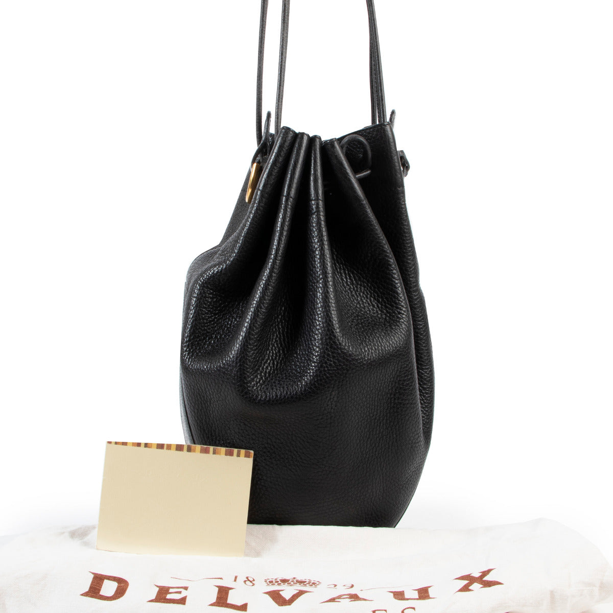 Delvaux Black Bucket Bag available at Labelov. buy and sell your designer items at a reasonable price online or in store and give your items a second life.