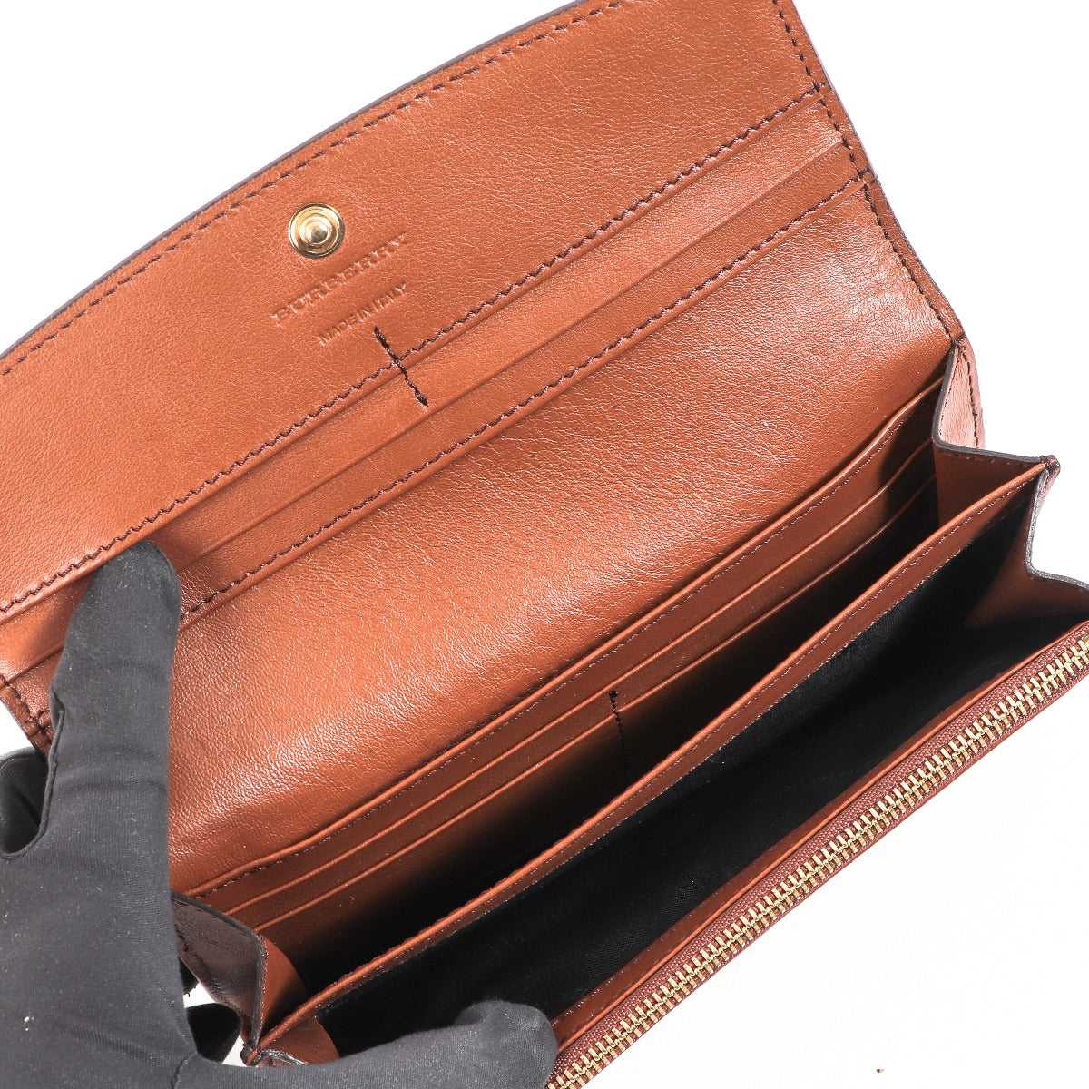 Buy an authentic second-hand Burberry Check Leather Wallet in very good condition at Labellov in Antwerp.