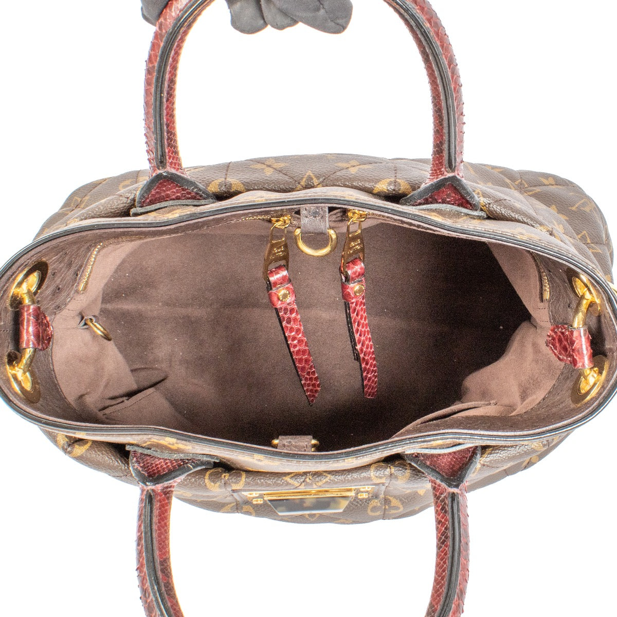 Shop safe online at Labellov in Antwerp, Brussel and Knokke this 100% authentic second hand Louis Vuitton Monogram Etoile Exotique Top Handle Bag