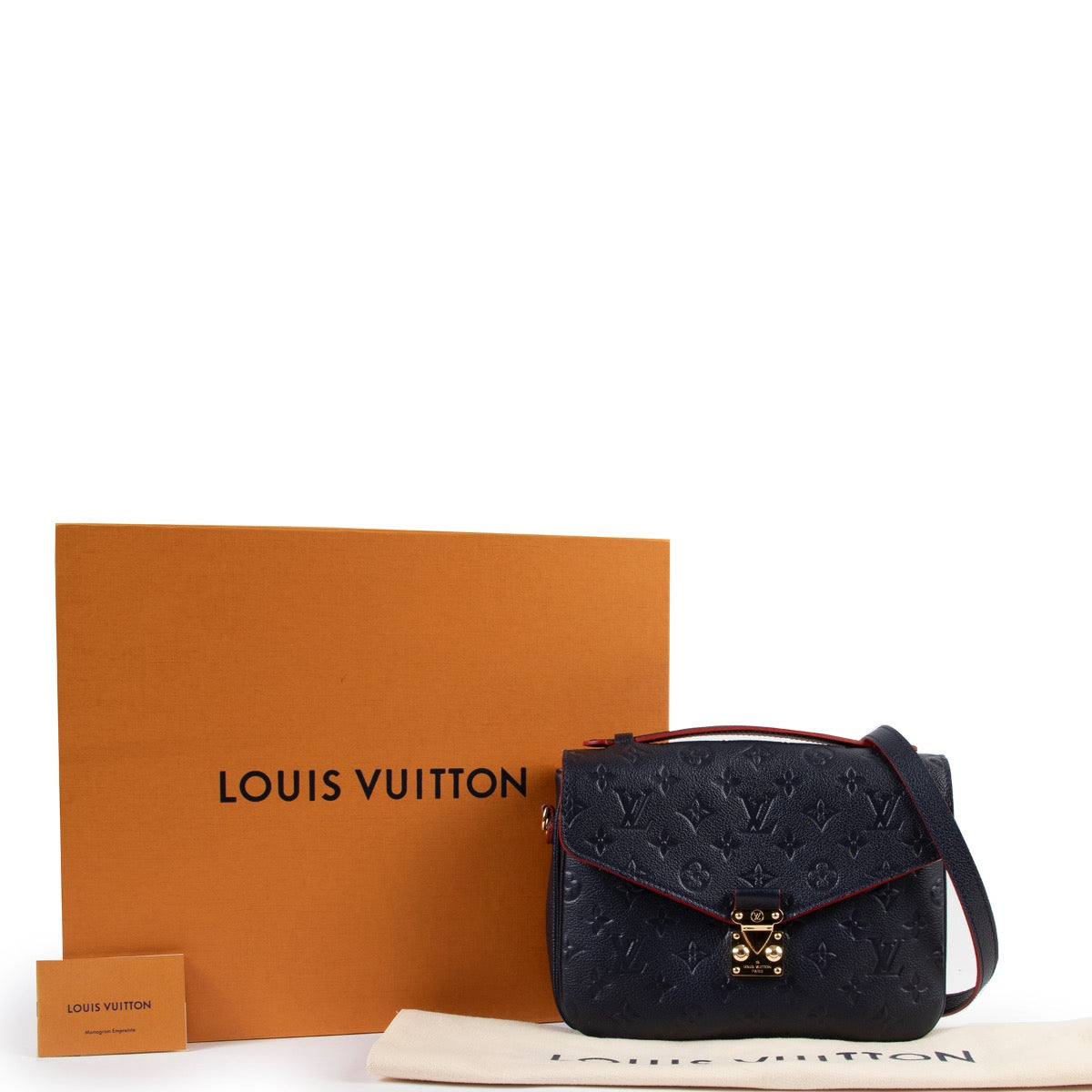 Louis Vuitton Navy Monogram Empreinte Leather Pochette Métis Bag Buy this gorgeous bag here safely!