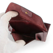 Buy an authentic second hand Delvaux Burgundy Leather Wallet in very good condition at Labellov