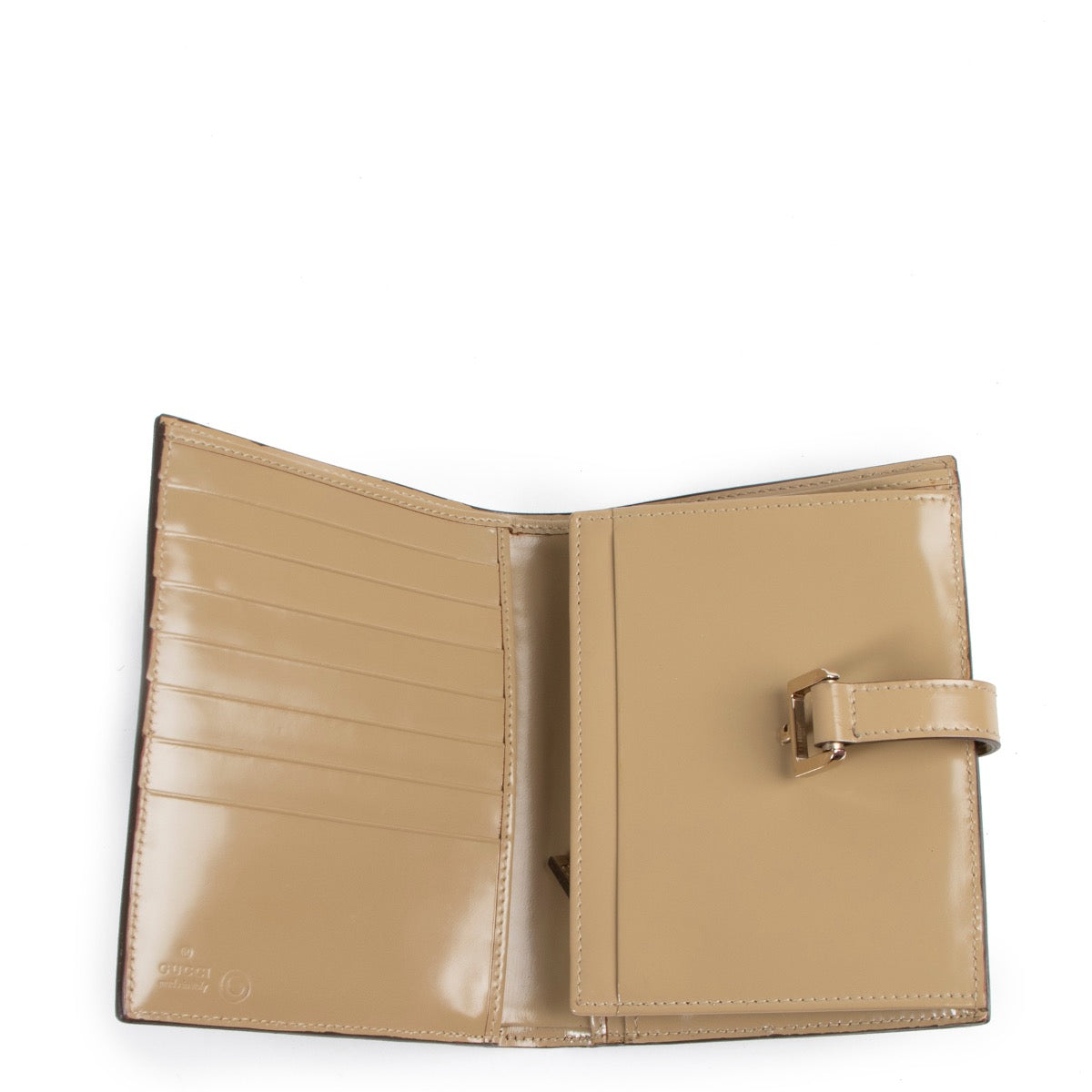 Ruime beige Gucci portefeuille in goede staat tweedehands kopen.